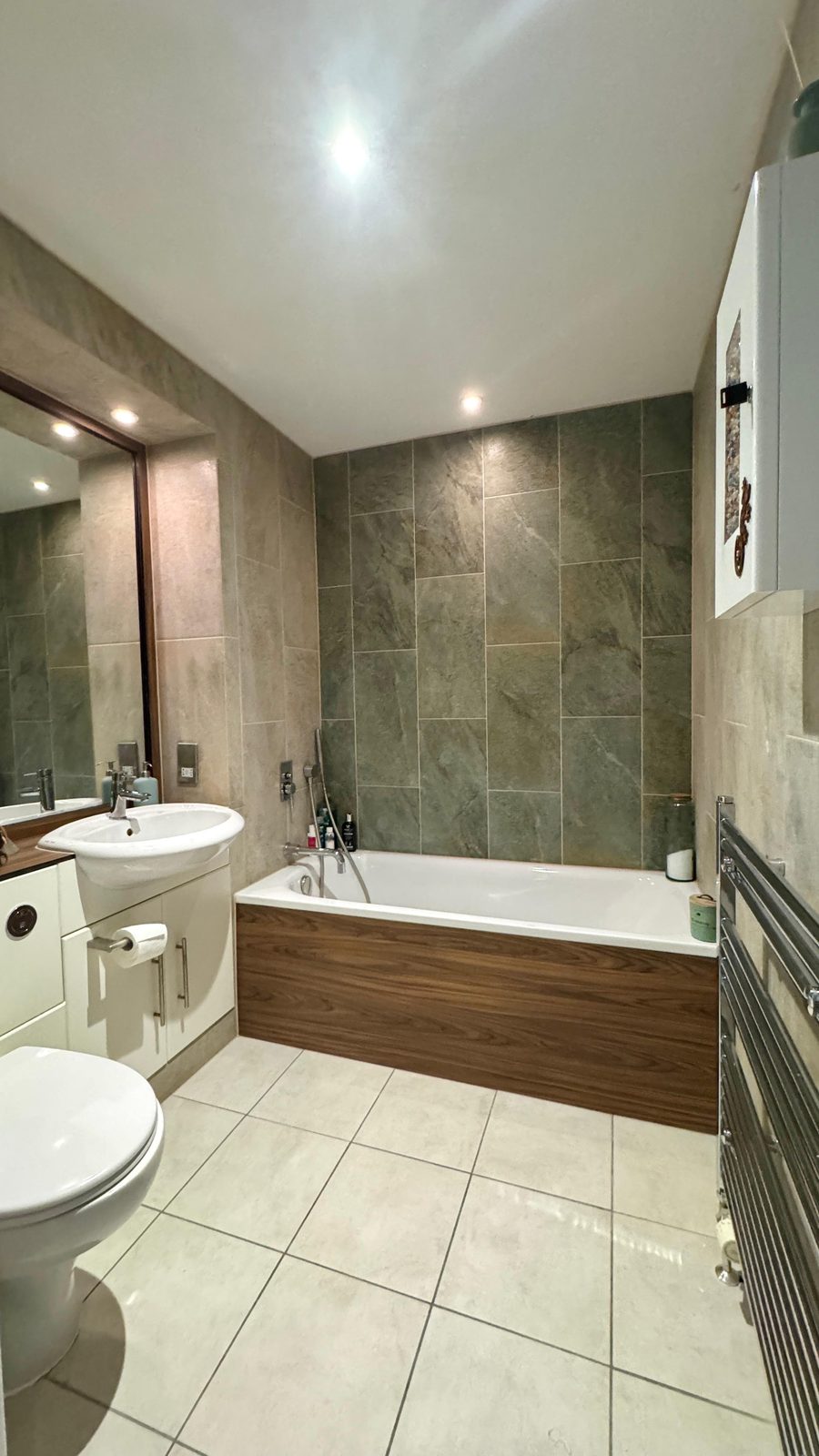 Slate bathroom with freestanding slipper bath